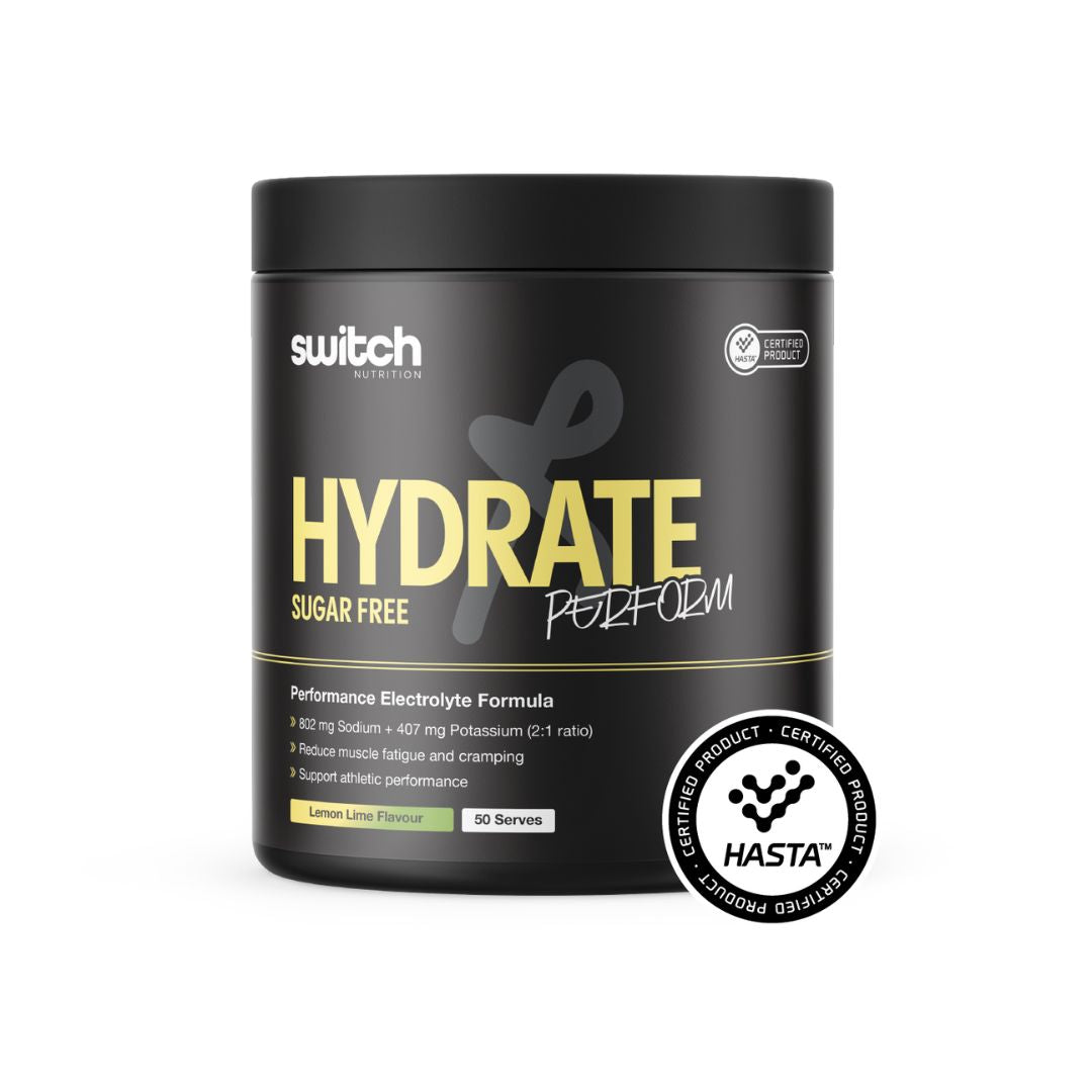 Switch Nutrition Hydrate Perform Sugar Free electrolyte powder tub showing hydration supplement with sodium, potassium, taurine and vitamins for performance hydration