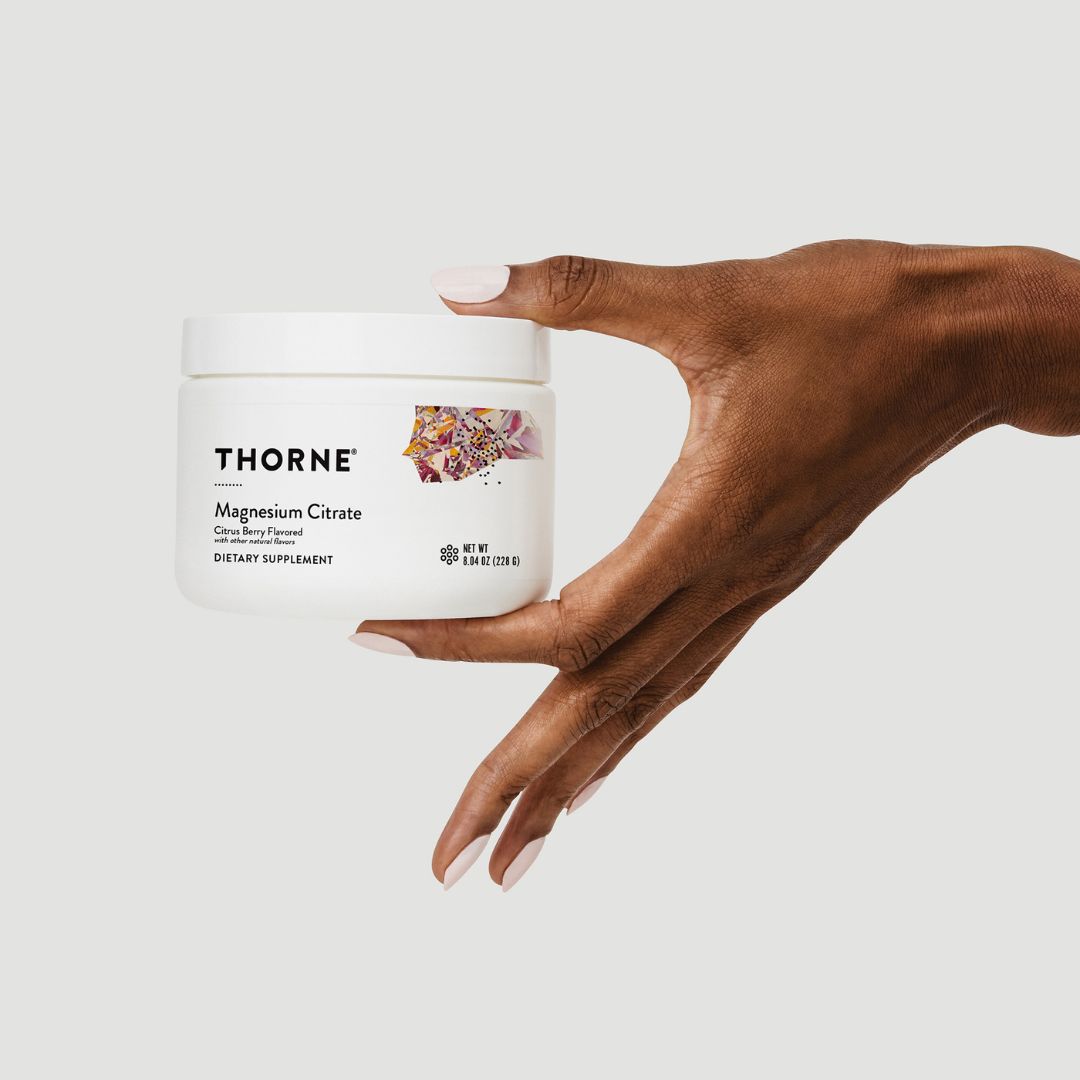 Thorne Magnesium Citrate Powder Citrus Berry container providing 250mg elemental magnesium per serving in a fast-dissolving powder format.