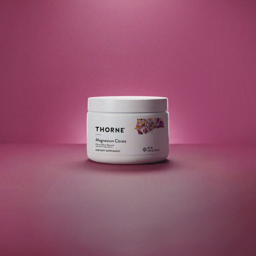 Thorne Magnesium Citrate Powder Citrus Berry container providing 250mg elemental magnesium per serving in a fast-dissolving powder format.