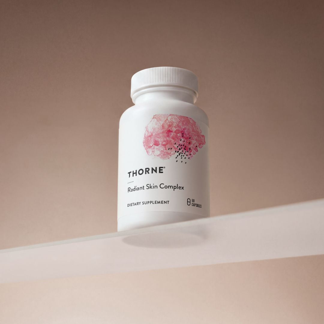 Thorne Radiant Skin Complex supplement bottle featuring Ovolux™ eggshell membrane extract and Eternalyoung® botanical blend in capsule format.