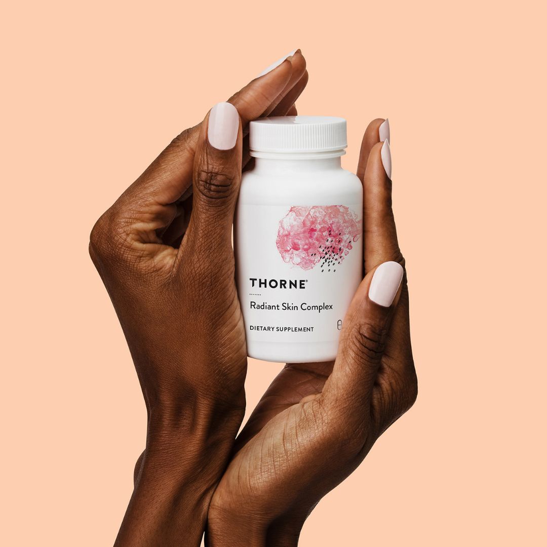 Thorne Radiant Skin Complex supplement bottle featuring Ovolux™ eggshell membrane extract and Eternalyoung® botanical blend in capsule format.